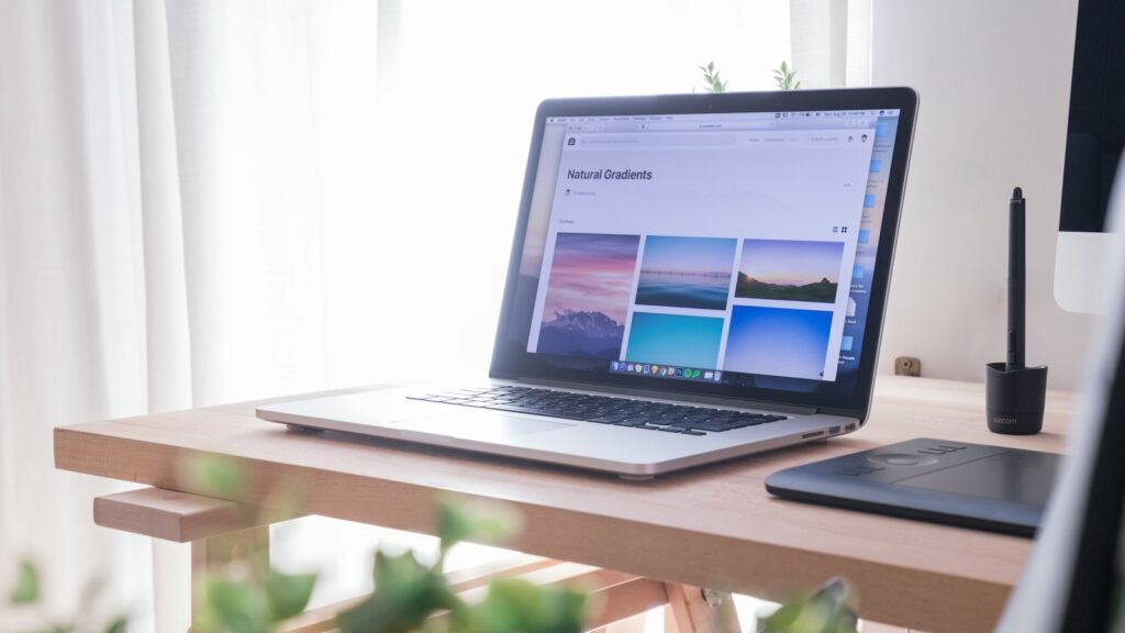 Designer reviewing UI/UX bootcamp cost breakdown at a laptop workspace